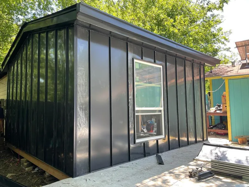 Black standing seam metal wall panels for Roof Inspection in Desert Hot Springs